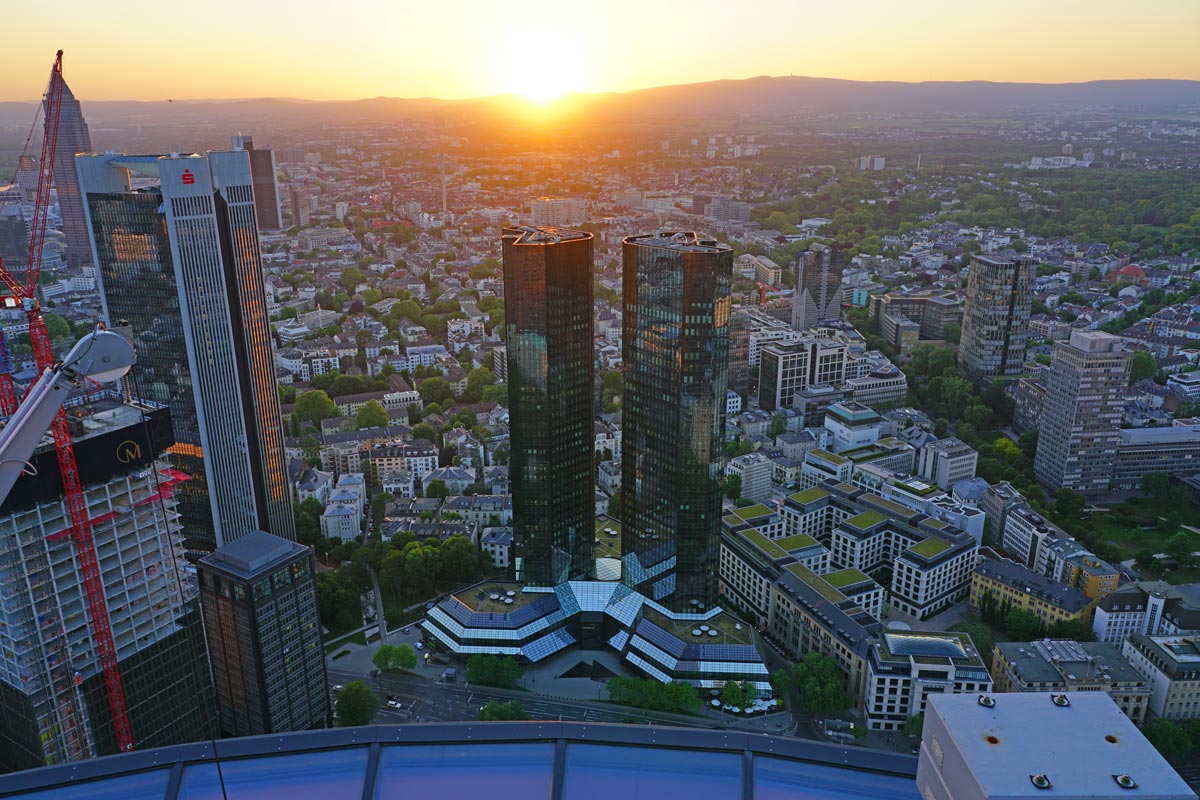 Image shows a bird's eye view of an urban city centre with skyscrapers and office buildings