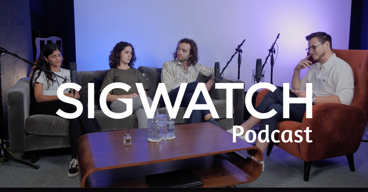 Can see four people seated around a table having a conversation. 'SIGWATCH podcast' appears as text over the picture